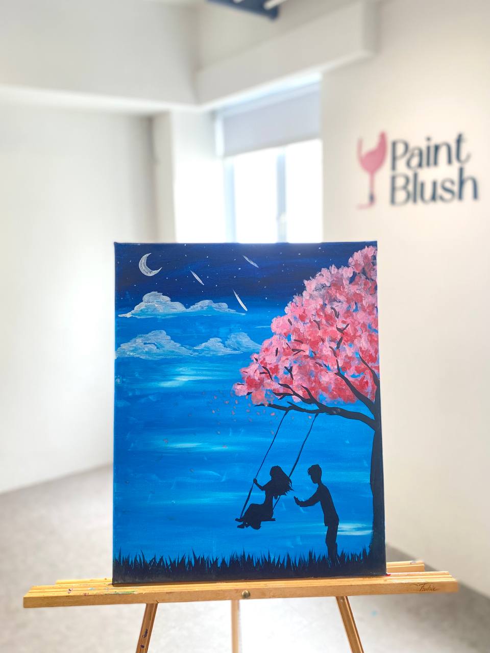 Day & Night - Couple playing on the Swing